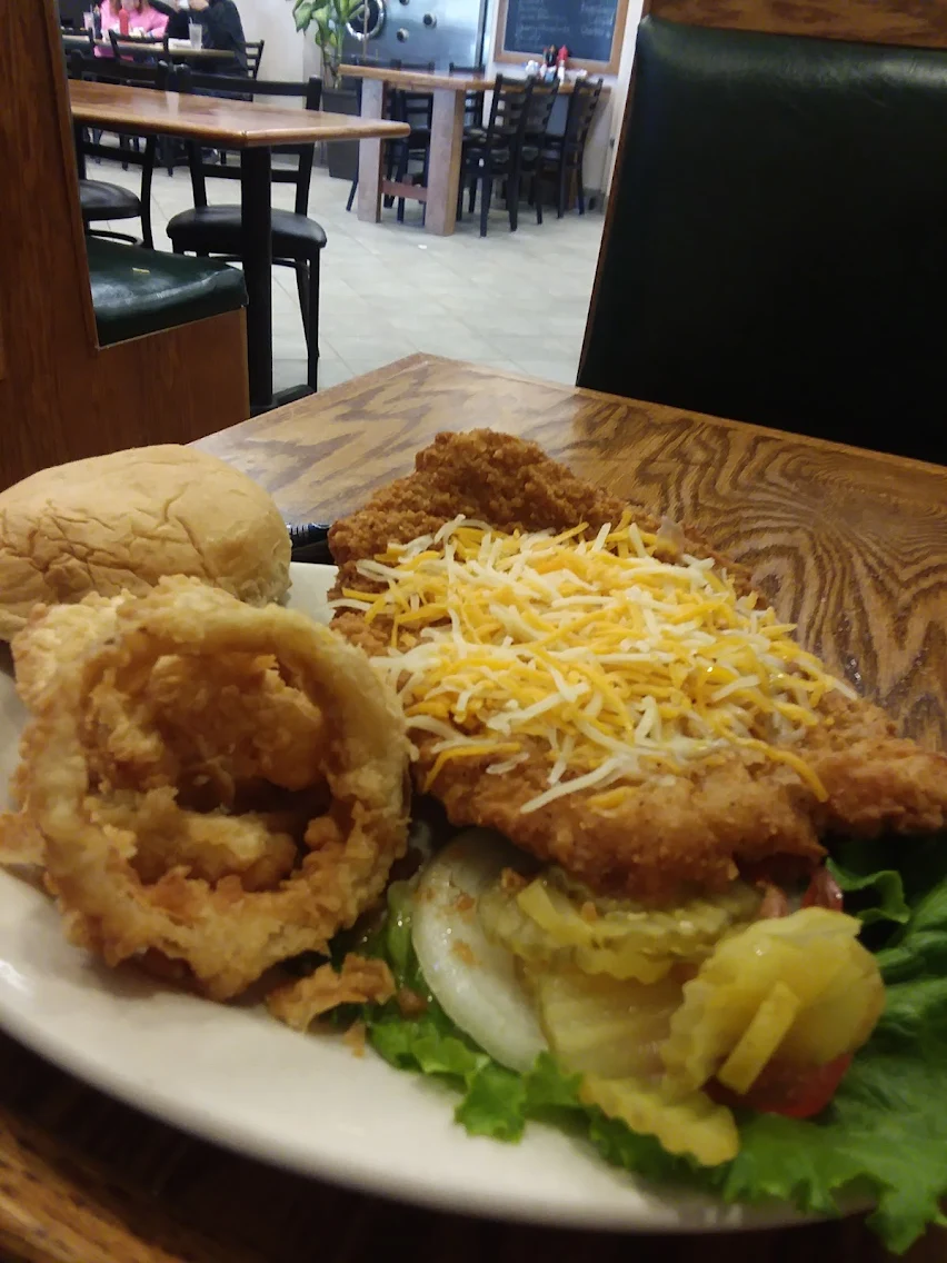 Country fried steak dinner plate served with two sides and a roll at Roxanne's Cafe, Parkville MO